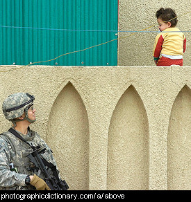 Photo of a child above a soldier