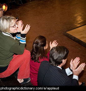 Photo of people applauding