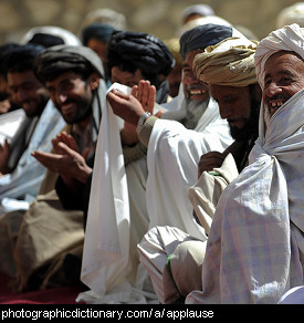 Photo of men applauding