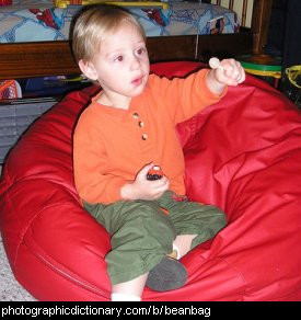 Photo of a child sitting in a beanbag