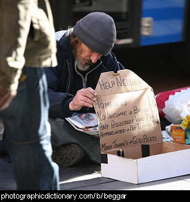 Photo of a man begging.