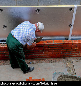 Photo of a bricklayer at work
