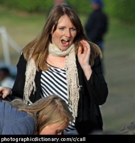 Photo of a woman calling out