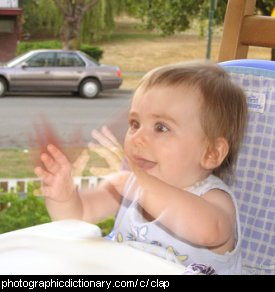 Photo of a baby clapping