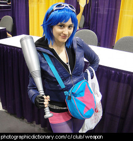 Photo of a woman holding a club