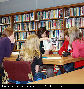 Photo of a group of teens in a library