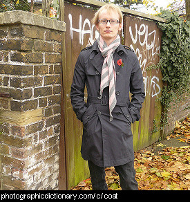 Photo of a man wearing a coat.