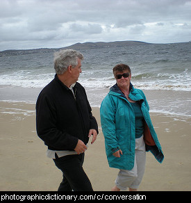 Photo of two people having a conversation