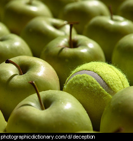 Photo of a tennis ball pretending to be an apple