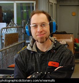 Photo of a man wearing earmuffs