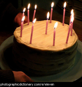 Photo of a cake with 11 candles