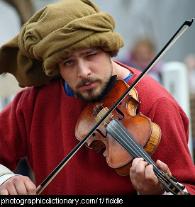 Photo of a man playing a violin