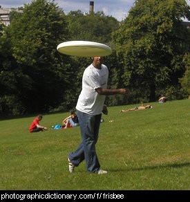 Photo of a man throwing a frisbee