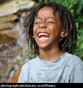Photo of a child laughing