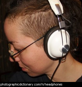 Photo of someone wearing headphones