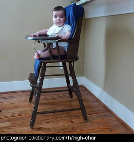 Photo of a baby in a high chair
