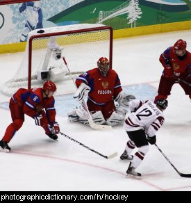 Photo of people playing hockey