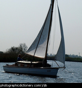 Photo of a boat with a jib