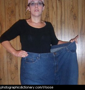 Photo of a woman wearing very loose jeans