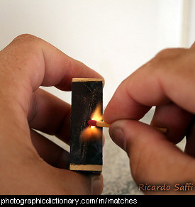 Photo of a match being lit