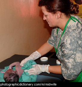 Photo of a midwife and baby