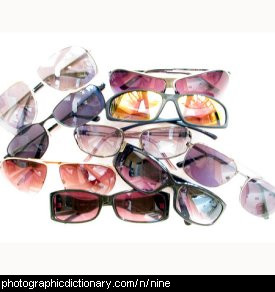 Photo of nine sunglasses.