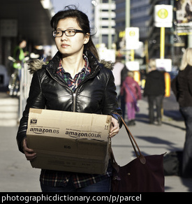 Photo of a woman holding a parcel