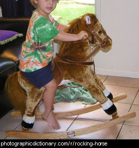 Photo of a child on a rocking horse