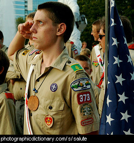 Photo of a boy scout saluting