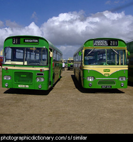 Photo of two similar looking buses