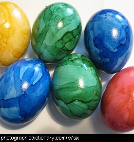 Photo of six painted eggs.