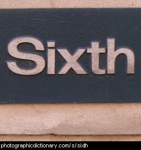 Photo of a sign that says sixth