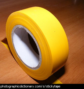 Photo of yellow stickytape.