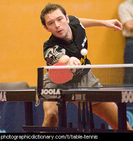 Photo of a man playing table tennis