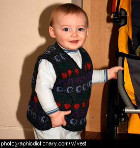 Photo of a baby wearing a vest