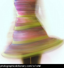 Photo of a woman whirling around