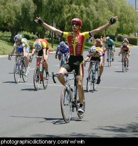 Photo of a cyclist winning a race