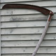 Photo of a scythe.