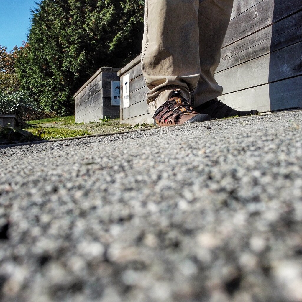 Photo of a man near his home