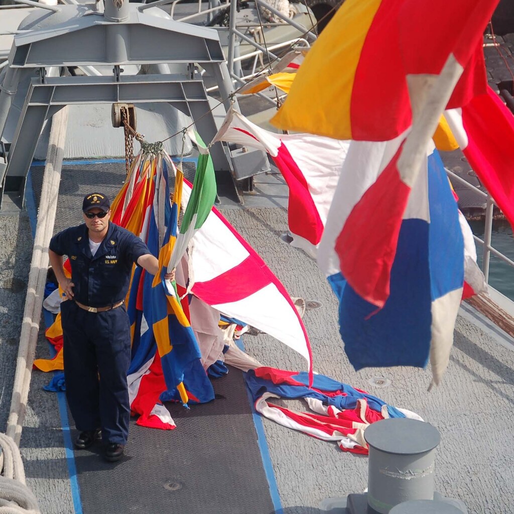 Photo of a ship flying colors