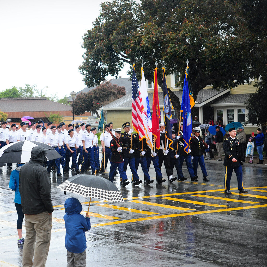 Photo of a parade being rained on