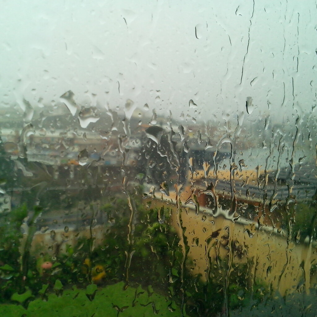 Photo of rain through a window